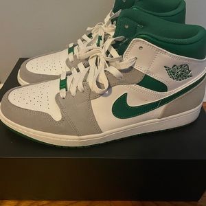 Green, white, and grey Jordan 1s pre- owned in great condition